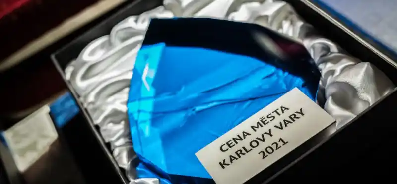 cena města