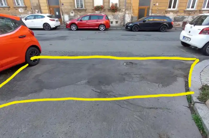 Výmol na vozovce 